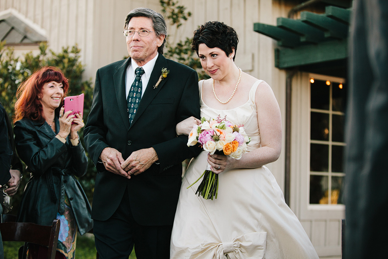 Jaime walking down the aisle with her dad.