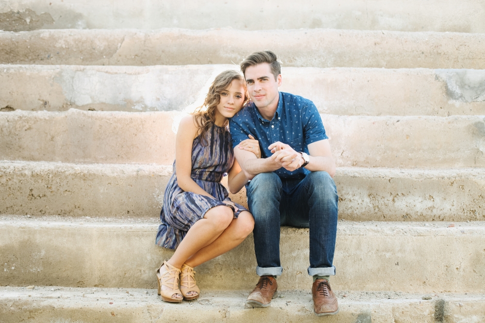 Jordan and Riley sitting on concrete steps. 