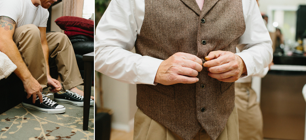 The groom wore converse sneakers and a brown vest. 