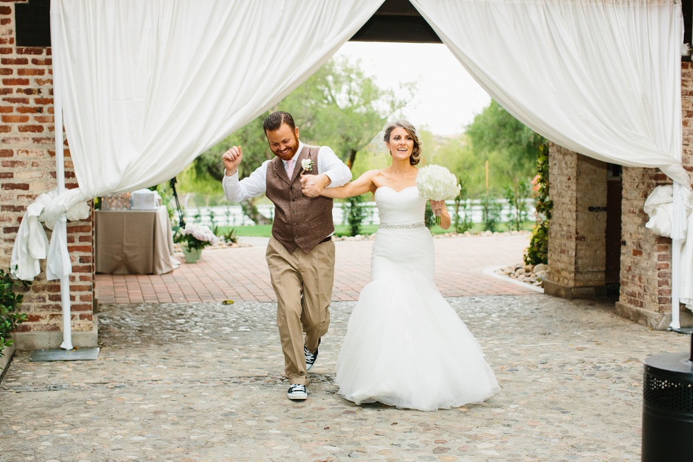 Here is a photo of the bride doing their grand entrance into the reception. 