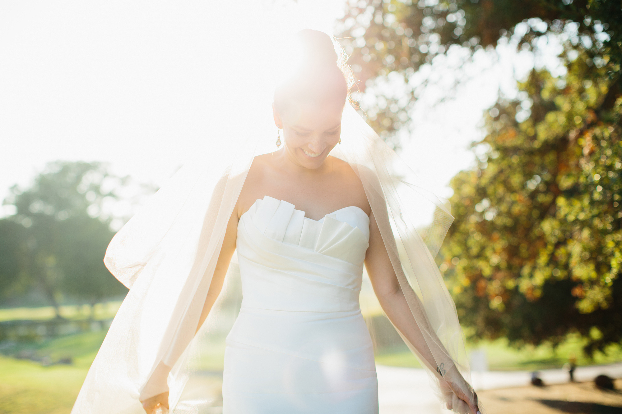 Here is a beautiful photo of the bride wearing her veil. 