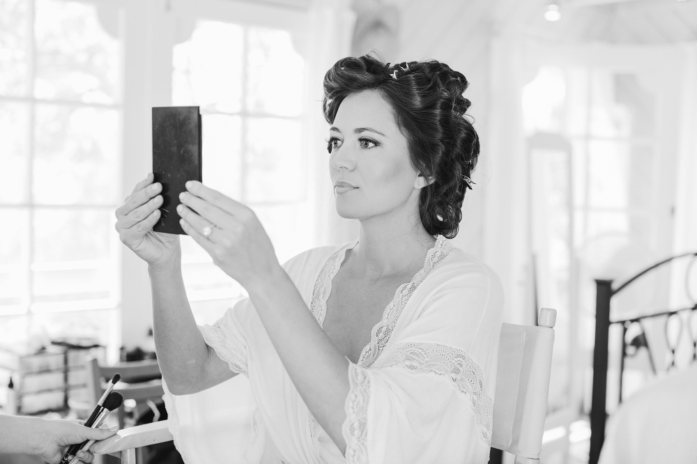 Jessica checking her wedding hair and make up. 