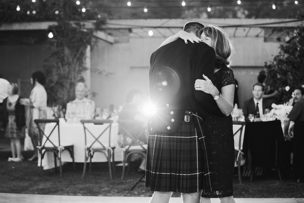 A beautiful black and white photo of the mother son dance. 