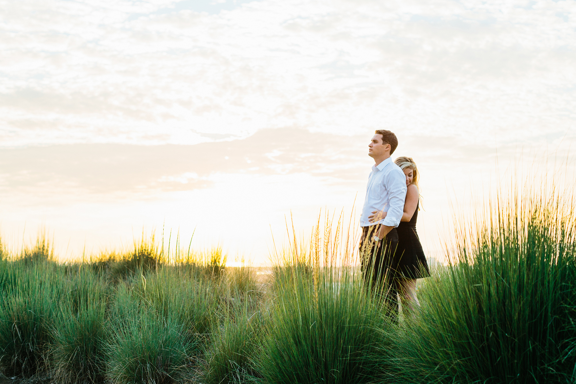 Alyssa and James in wild grass. 