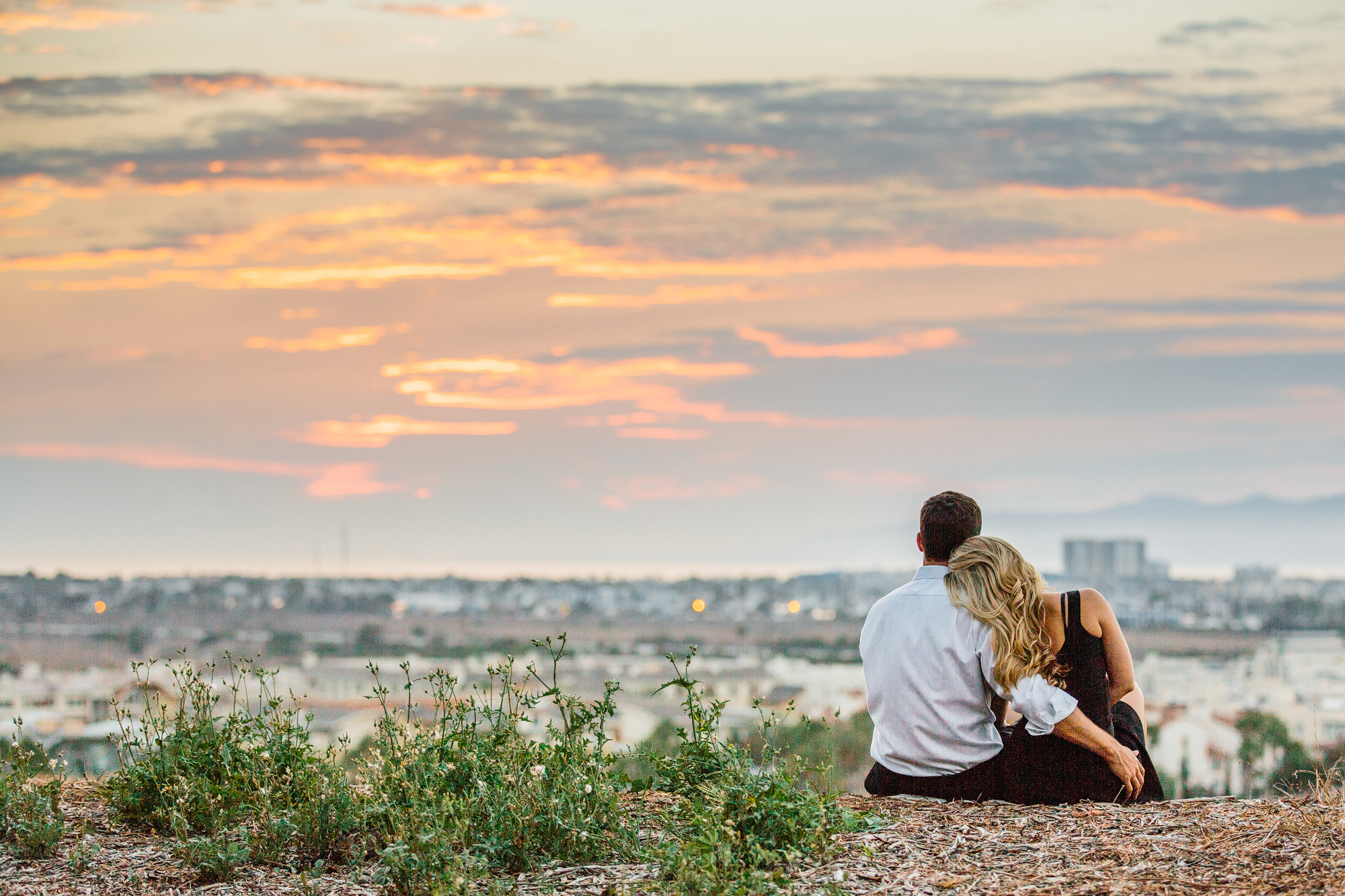 The couple looking out over the city. 