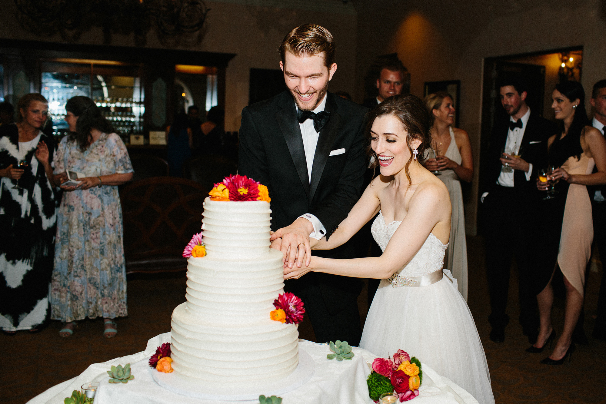 Laura and Karl cutting their cake. 