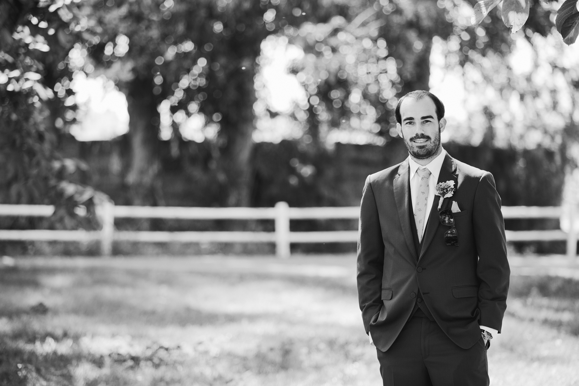 The groom in his suit. 