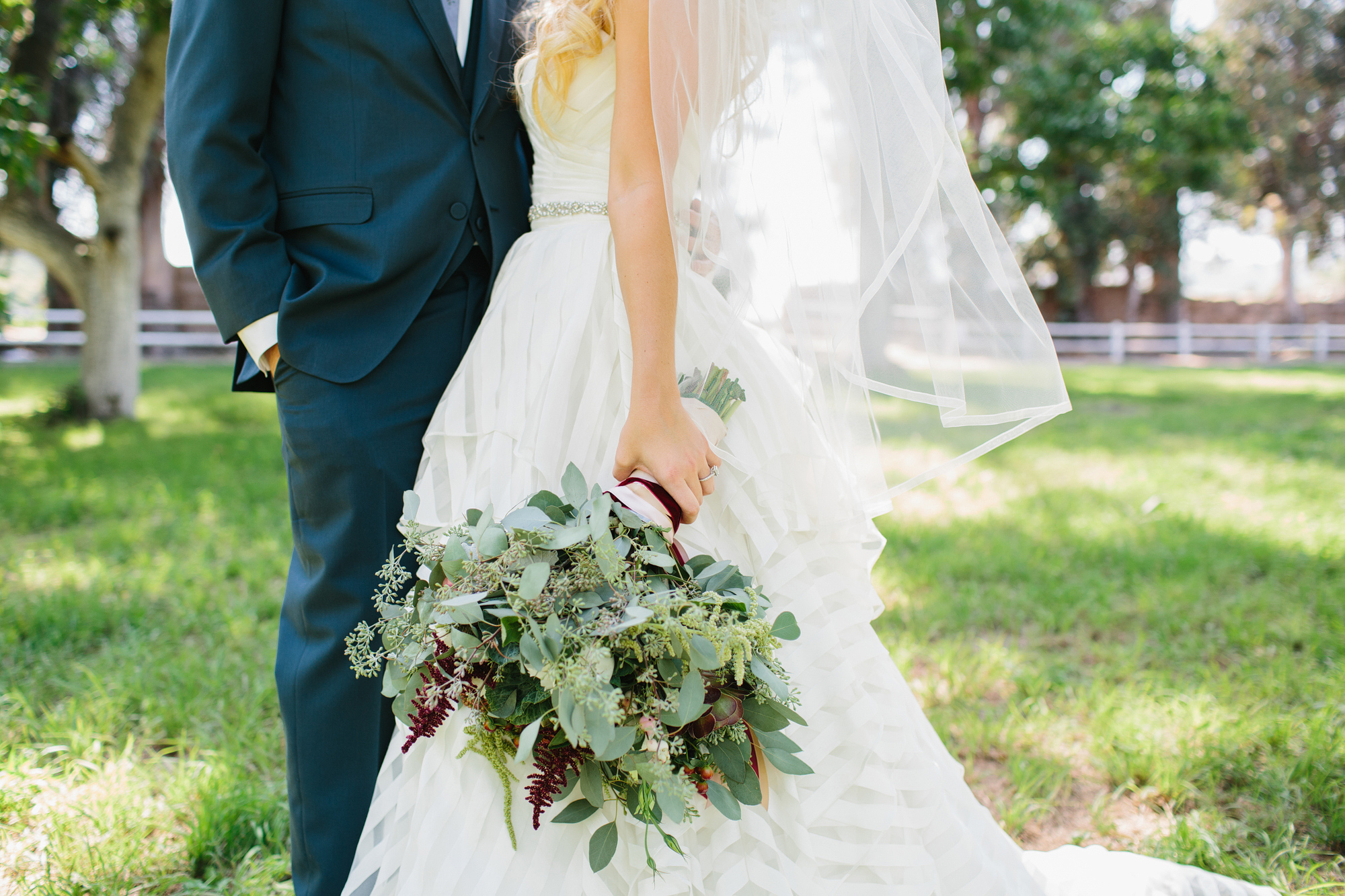 Katie and Chad in a field at Walnut Grove. 