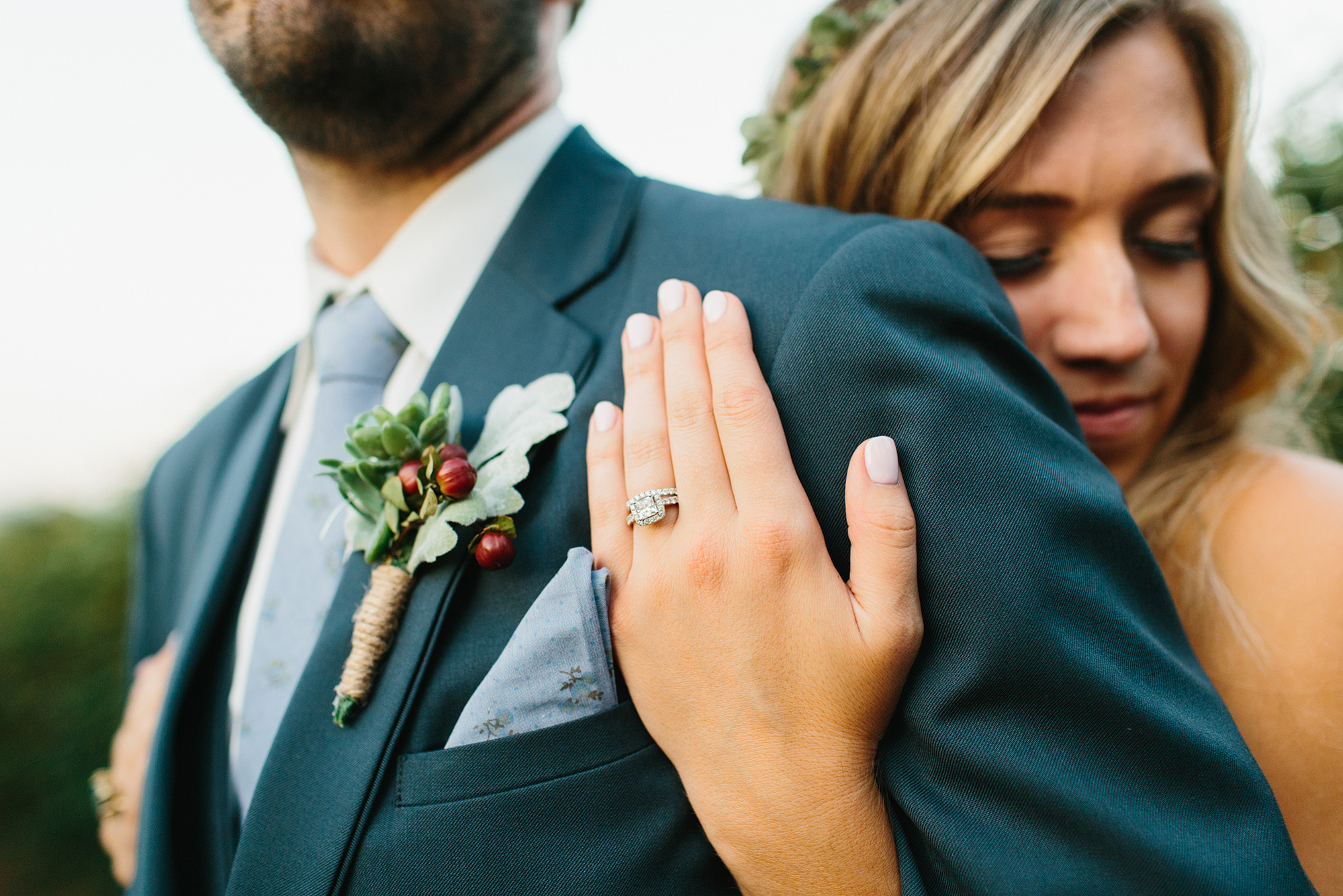 A photo of Katie + Chad and her ring. 