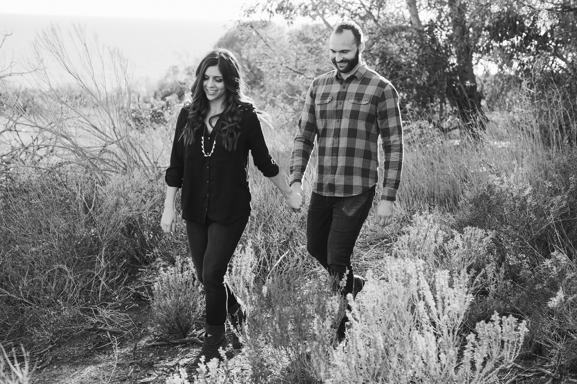 Desi and Curtis walking together in the fields. 