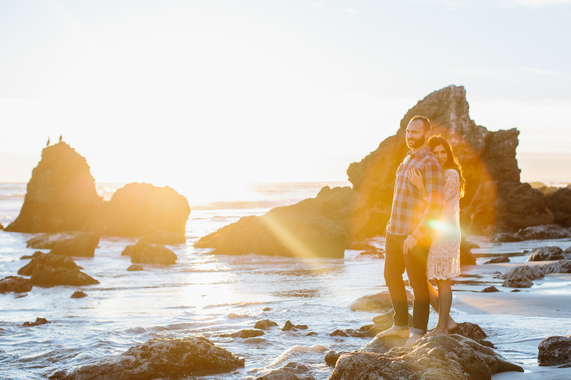 Desi and Curtis on the beach at sunset. 