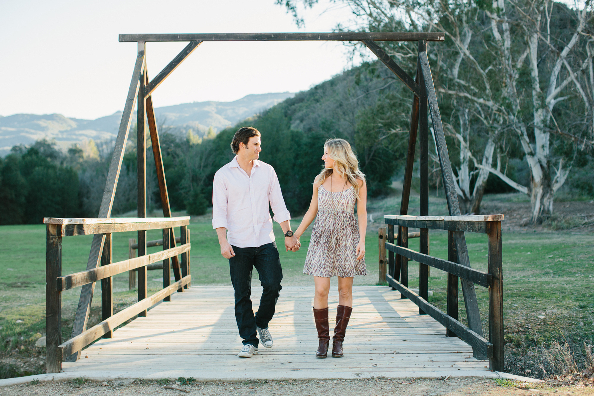 Megan and Travis on a bridge. 