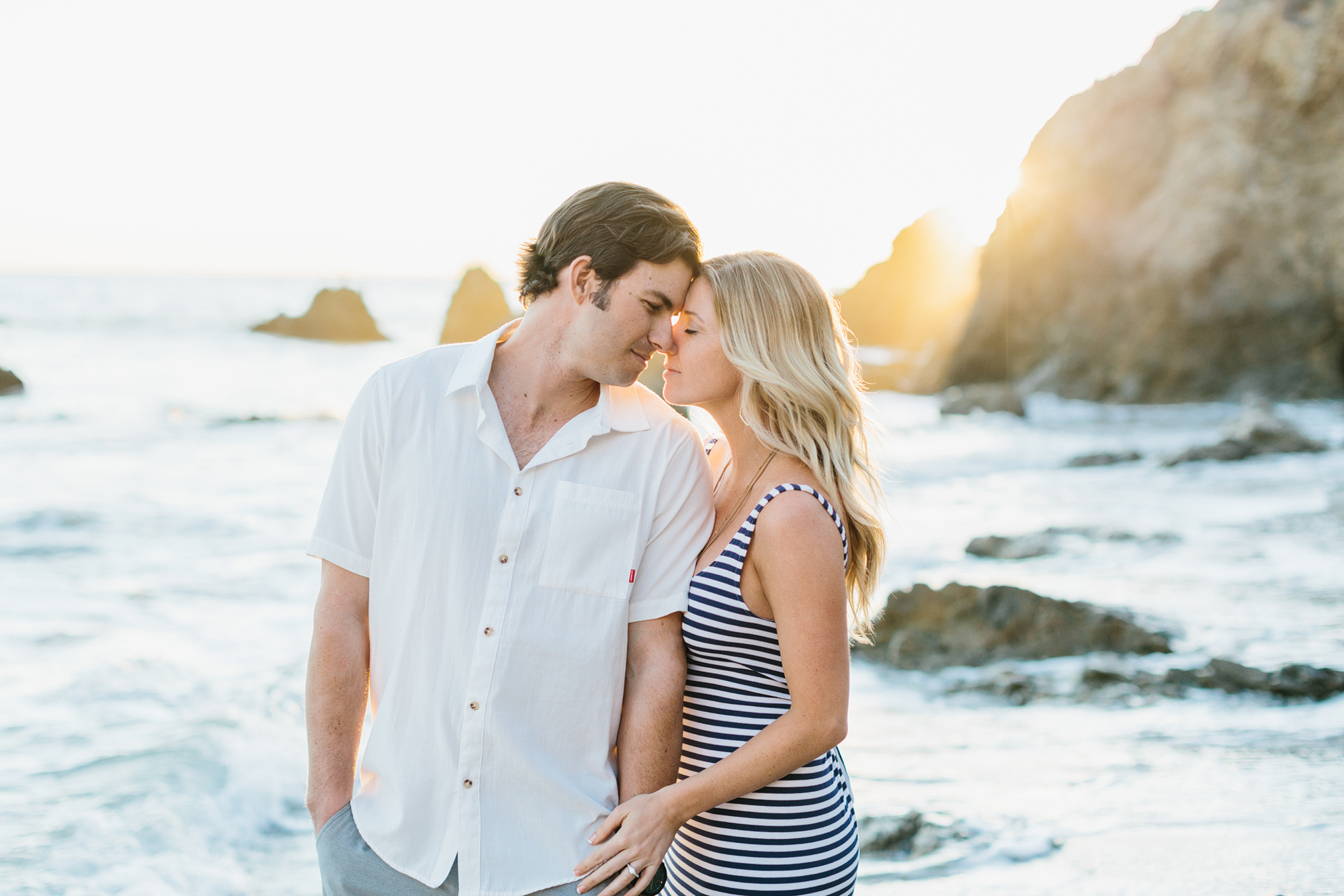 The couple touching noses. 